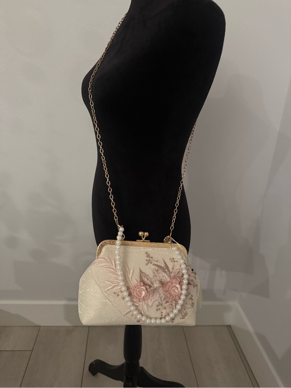 Fashion Bug Cream Clutch with Pink Floral Embroidery & Pearl Accent